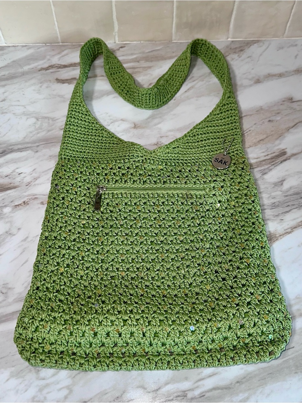 The Sak green crochet hobo shoulder bag with sequin accents- Like New